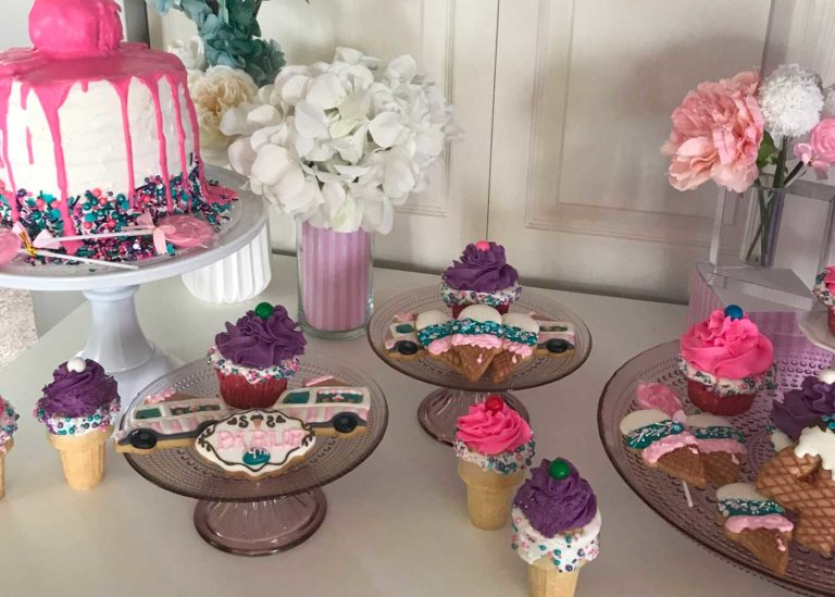 ICE CREAM THEMED DECORATED COOKIES AND CUPCAKES STAGED WITH DECOR