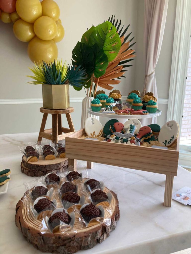 DINOSAUR THEMED DESSERT TABLE STAGED WITH DECOR